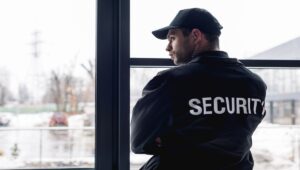 Explain how trained guards balance customer service with theft prevention and emergency response.